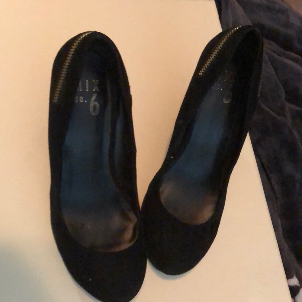 Black sued wedges